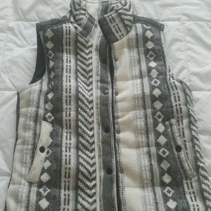 Size medium button-down vest thick and warm.
